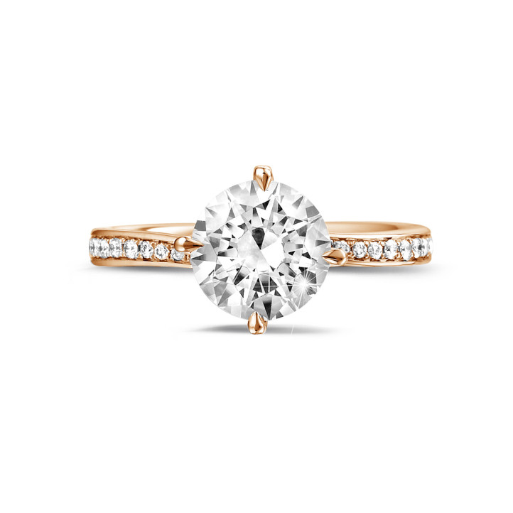 2.00 carat solitaire diamond ring in red gold with side diamonds