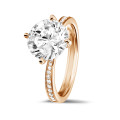 3.00 carat solitaire diamond ring in red gold with side diamonds