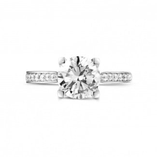 Rings - 1.50 carat solitaire diamond ring in platinum with side diamonds