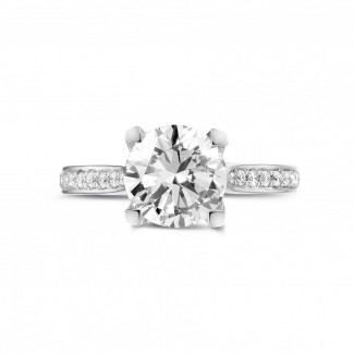 Engagement - 2.00 carat solitaire diamond ring in platinum with side diamonds