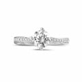 0.90 carat solitaire diamond ring in white gold with side diamonds