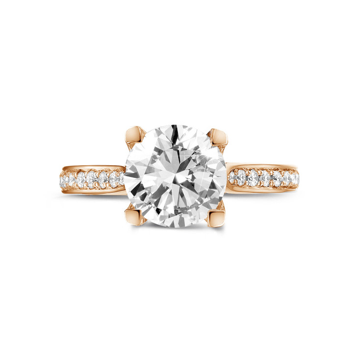 2.00 carat solitaire diamond ring in red gold with side diamonds