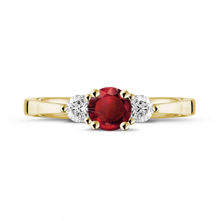 Trilogy ring in yellow gold with a central ruby and 2 round diamonds