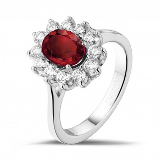 Entourage ring in platinum with an oval ruby and round diamonds