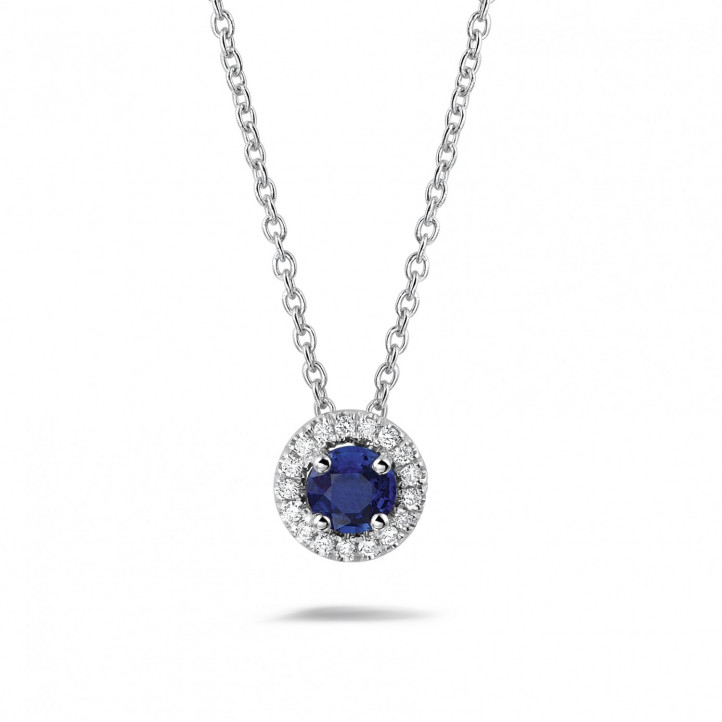 Halo necklace in white gold with a central sapphire and round diamonds