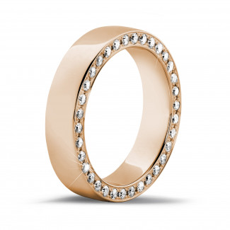 Gold wedding rings - 0.70 carat eternity ring in red gold with small round diamonds on the side