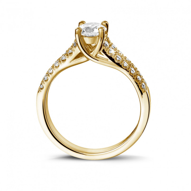 0.50 carat solitaire ring in yellow gold with side diamonds