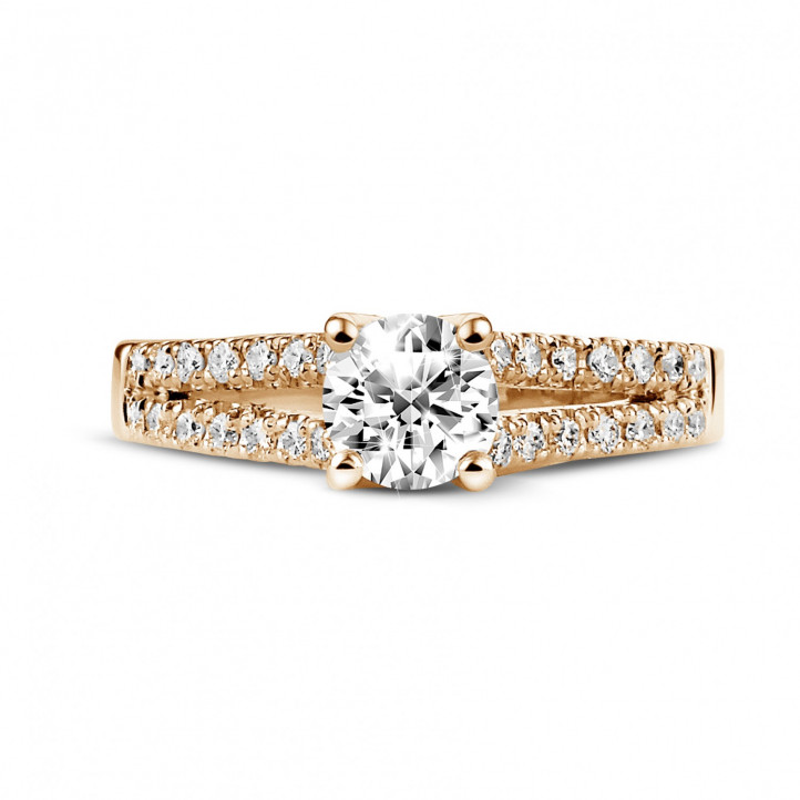 0.70 carat solitaire ring in red gold with side diamonds