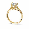 1.50 carat solitaire ring in yellow gold with side diamonds