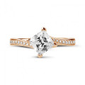 1.00 carat solitaire ring in red gold with princess diamond and side diamonds