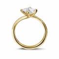 1.20 carat solitaire ring in yellow gold with princess diamond and side diamonds