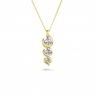 0.85 carat trilogy diamond pendant in yellow gold
