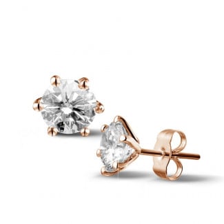 2.50 carat classic diamond earrings in red gold with six prongs