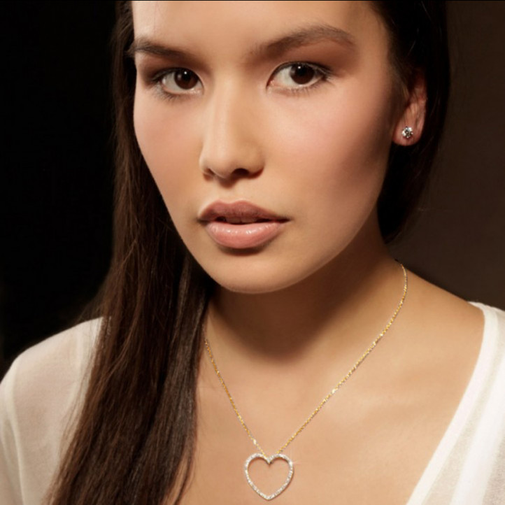 0.75 carat diamond heart shaped pendant in yellow gold