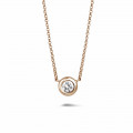 0.70 carat diamond satellite pendant in red gold