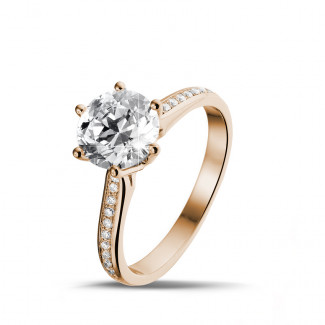 2.00 carat solitaire diamond ring in red gold with side diamonds