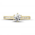 0.50 carat solitaire diamond ring in yellow gold with side diamonds