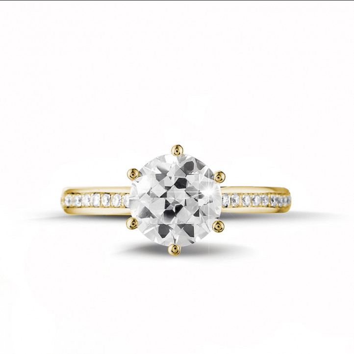 2.00 carat solitaire diamond ring in yellow gold with side diamonds