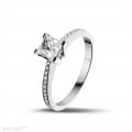 0.75 carat solitaire ring in white gold with princess diamond and side diamonds