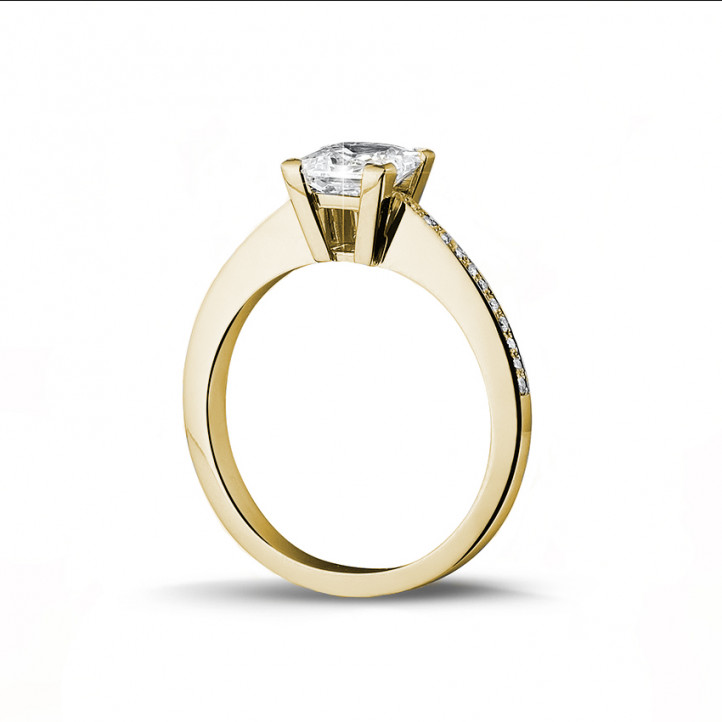1.50 carat solitaire ring in yellow gold with princess diamond and side diamonds