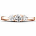 0.67 carat trilogy ring in red gold with round diamonds