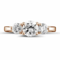 1.50 carat trilogy ring in red gold with round diamonds