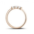 0.35 carat trilogy ring in red gold with round diamonds
