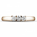 0.50 carat trilogy ring in red gold with round diamonds