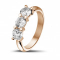 1.50 carat trilogy ring in red gold with round diamonds