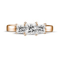 1.05 carat trilogy ring in red gold with princess diamonds