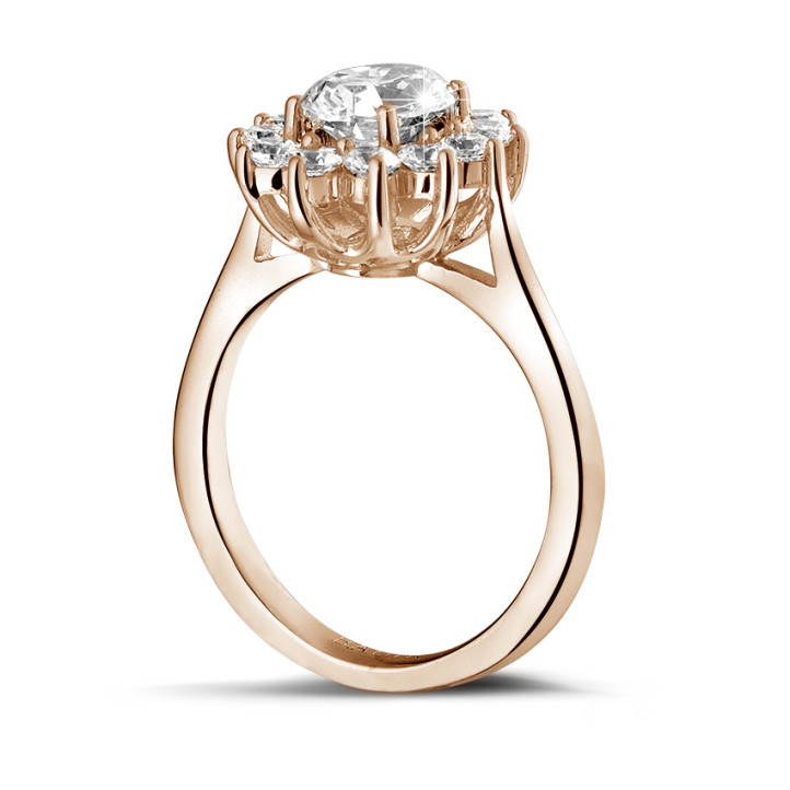 1.85 carat entourage ring in red gold with oval diamond