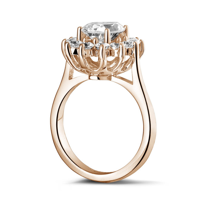 2.85 carat entourage ring in red gold with oval diamond