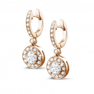 1.55 carat diamond halo earrings in red gold