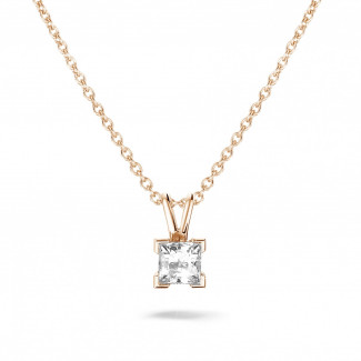 0.70 carat solitaire pendant in red gold with princess diamond