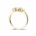 1.10 carat trilogy ring in yellow gold with side diamonds