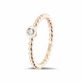 0.07 carat diamond stackable beaded ring in red gold