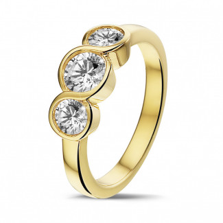 Rings - 0.95 carat trilogy ring in yellow gold with round diamonds