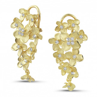 0.70 carat diamond design floral earrings in yellow gold