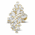 6.00 carat ring in yellow gold with marquise and round diamonds