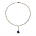 21.30 carat diamond gradient necklace in red gold with pear-shaped sapphire
