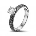 0.50 carat solitaire ring (half set) in white gold with black diamonds