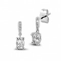 0.94 carat earrings in white gold with oval diamonds