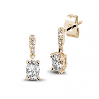 Earrings - 0.94 carat earrings in red gold with oval diamonds