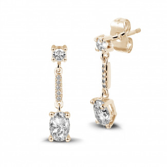 Earrings - 1.04 carat earrings in red gold with oval diamonds