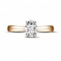0.58 carat solitaire ring in red gold with oval diamond