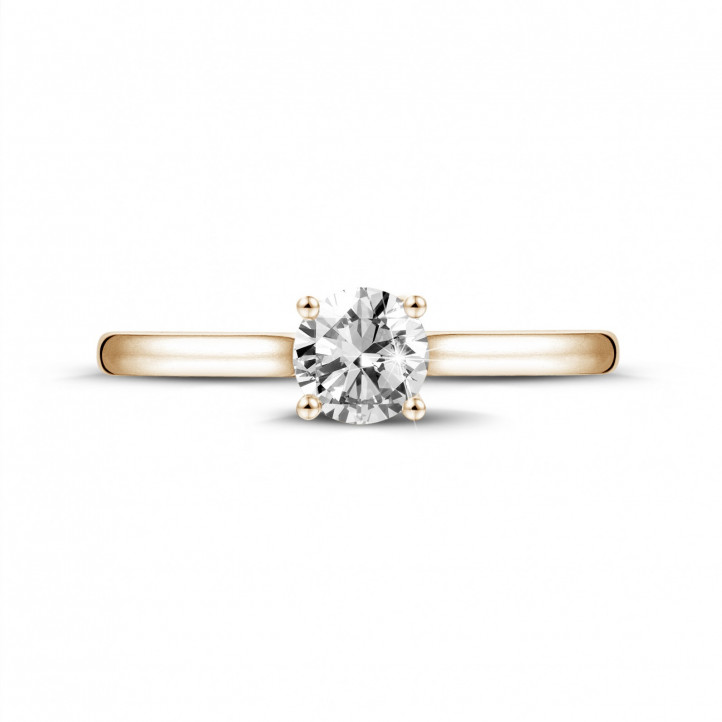 0.50 carat solitaire ring in red gold with round diamond and four prongs