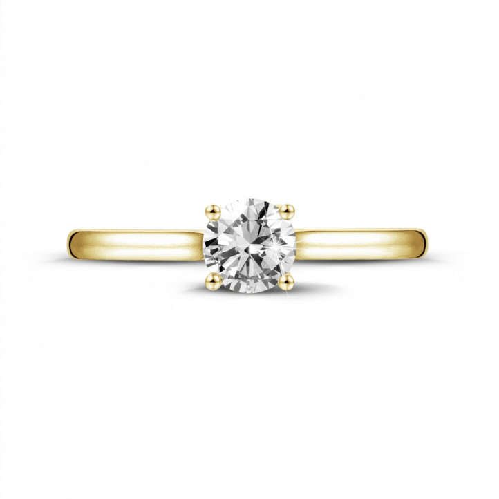 0.50 carat solitaire ring in yellow gold with round diamond and four prongs