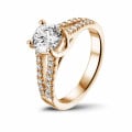 0.90 carat solitaire ring in red gold with side diamonds