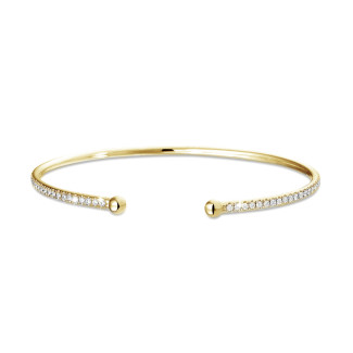 Fine jewellery - 0.75 carat diamond bangle in yellow gold