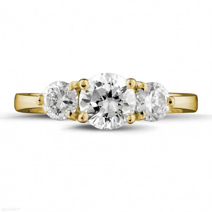 1.50 carat trilogy ring in yellow gold with round diamonds